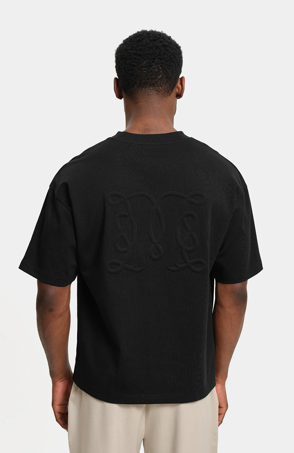 Embossed Monogram Back Logo T-shirt in Black - Image 3