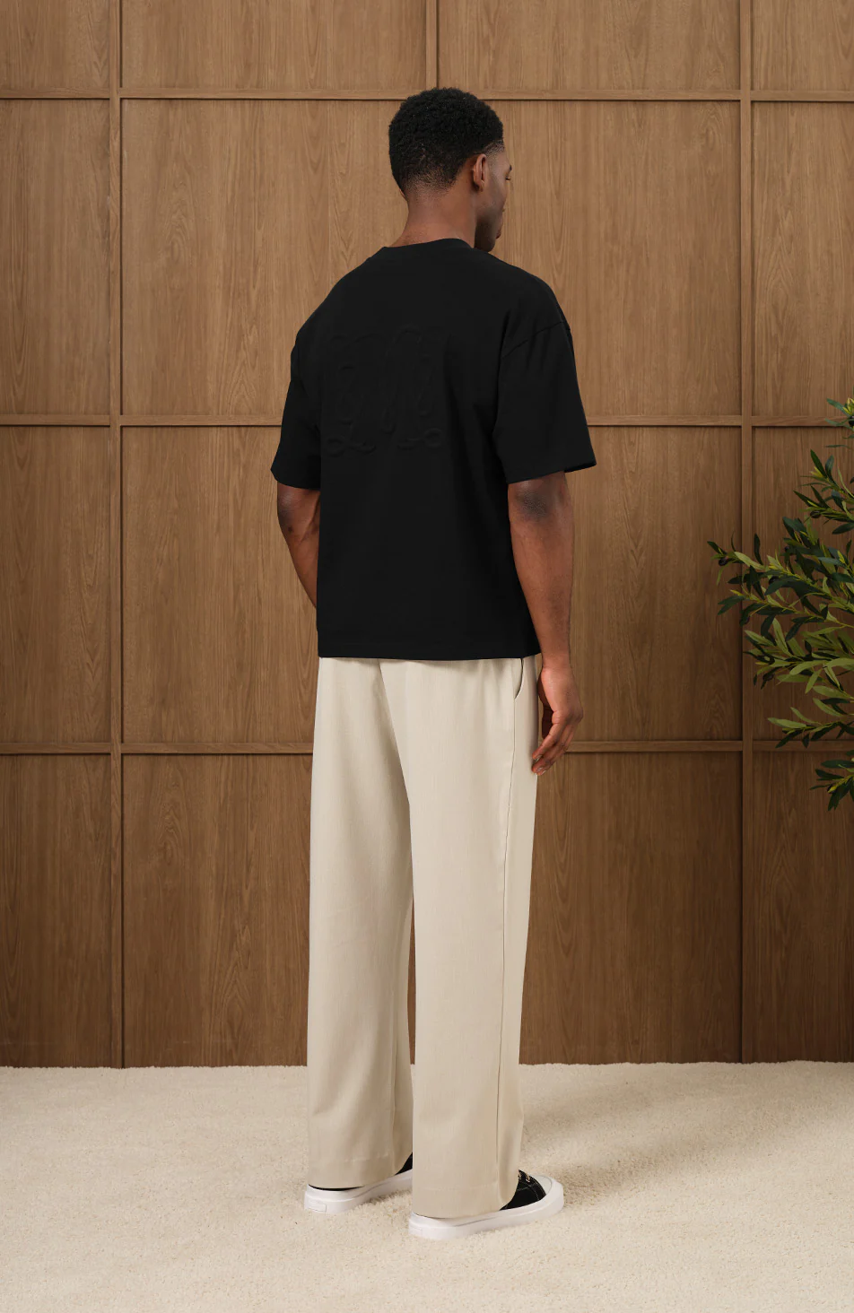 Embossed Monogram Back Logo T-shirt in Black - Image 6