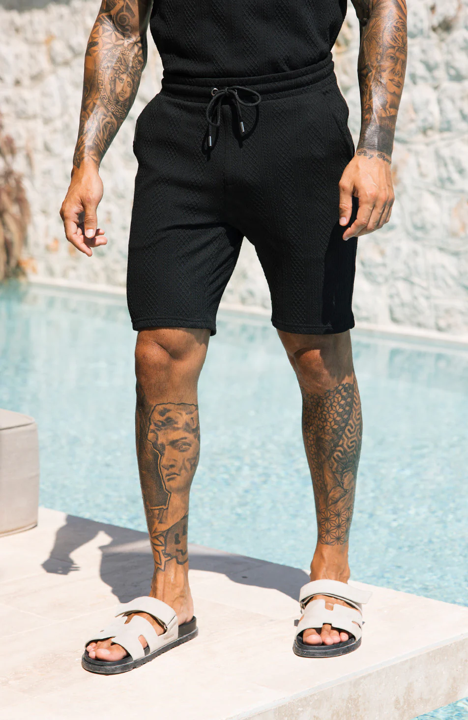 Tanami Textured Stretch Slim Shorts in Black - Image 4