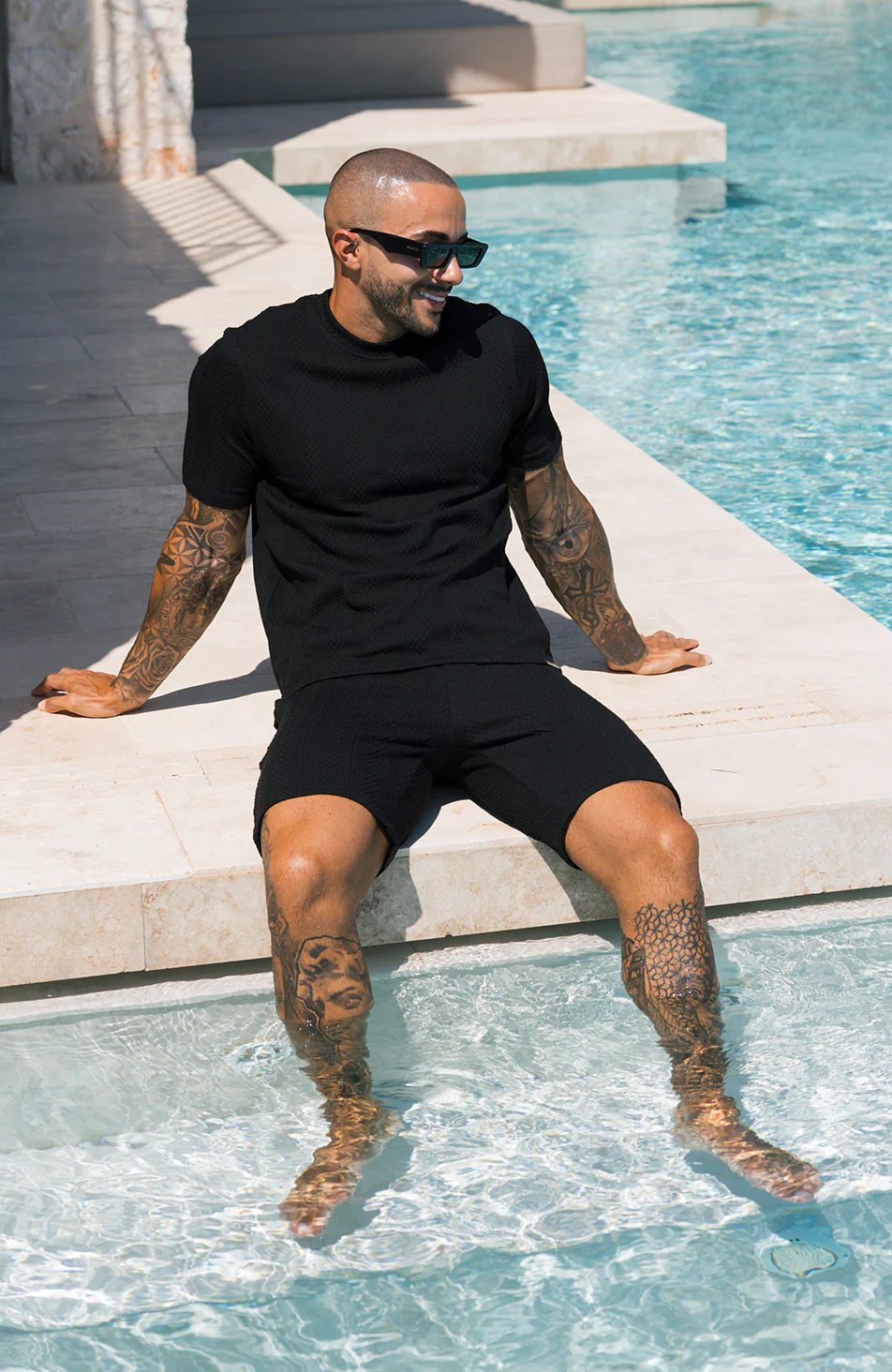 Tanami Textured Stretch Slim Shorts in Black - Image 6